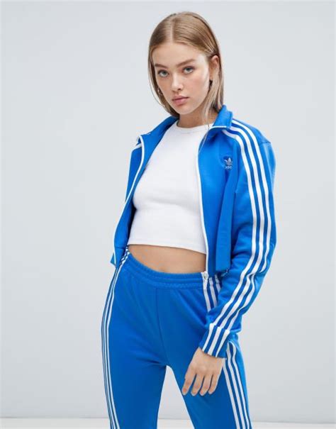 adidas jasje dames blauw|Blauwe adidas Zomerjassen voor dames online kopen .